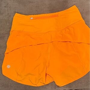 Lulu Lemon Women’s Speed Up shorts - Bright Orange- size 2 ( 4 inch)